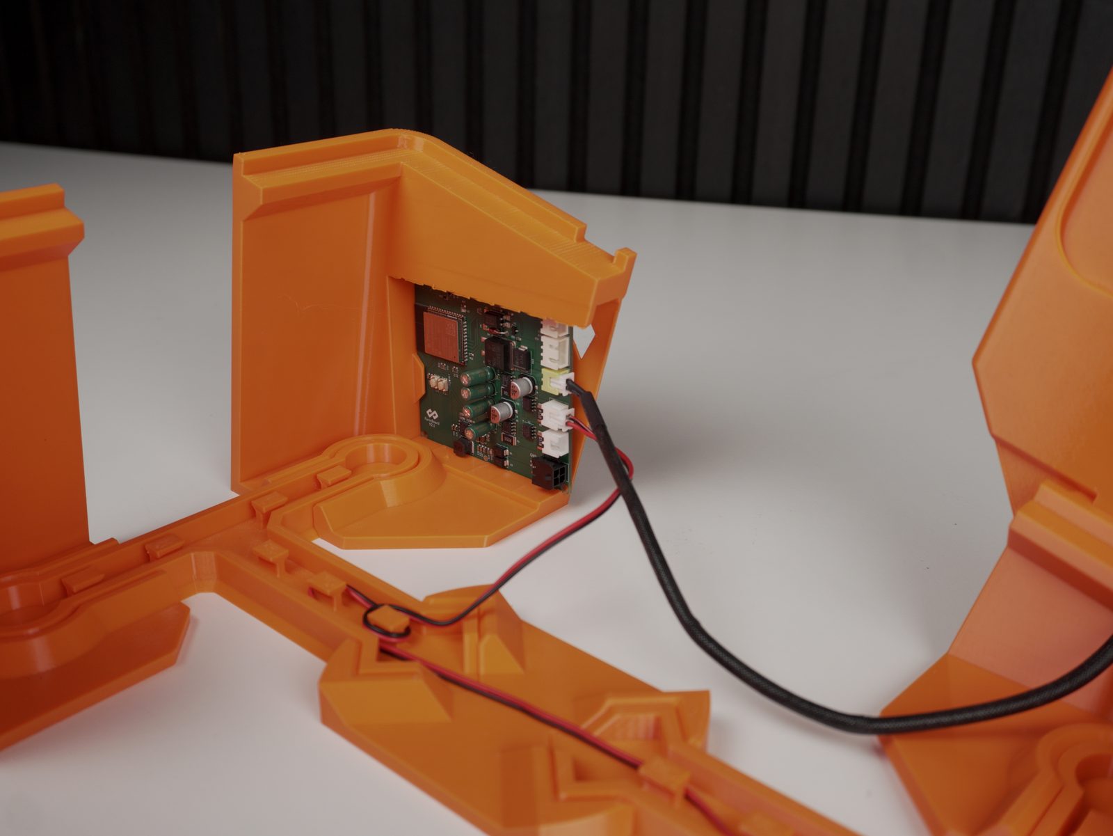 Completed PCB + fan + linear-actuator module, fully wired