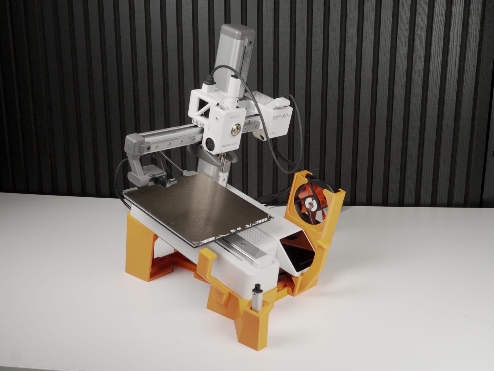 Printer fully seated on the tilted base, fan and actuator module mounted