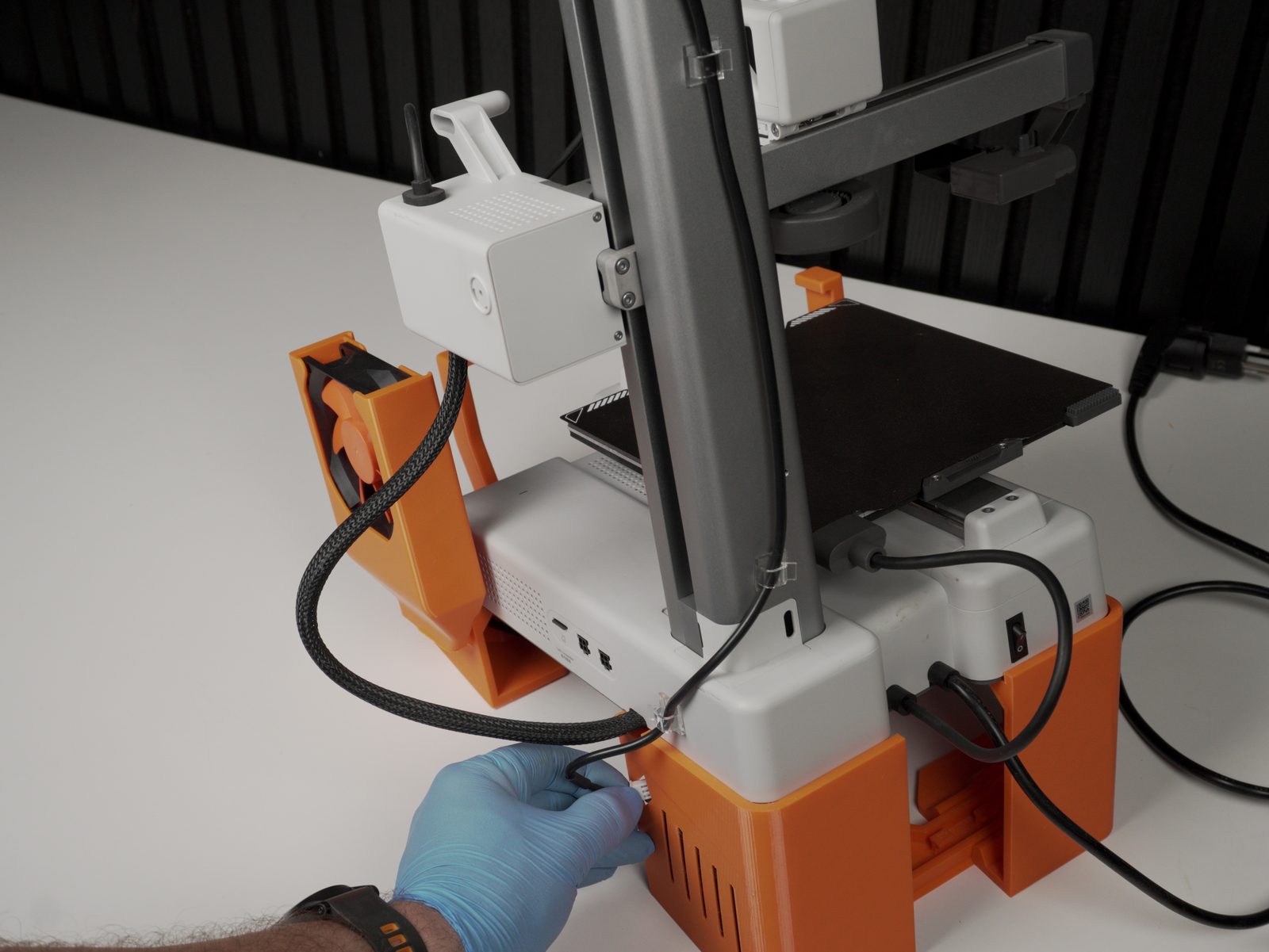 PCB housing mounted onto the printer's rear gantry post