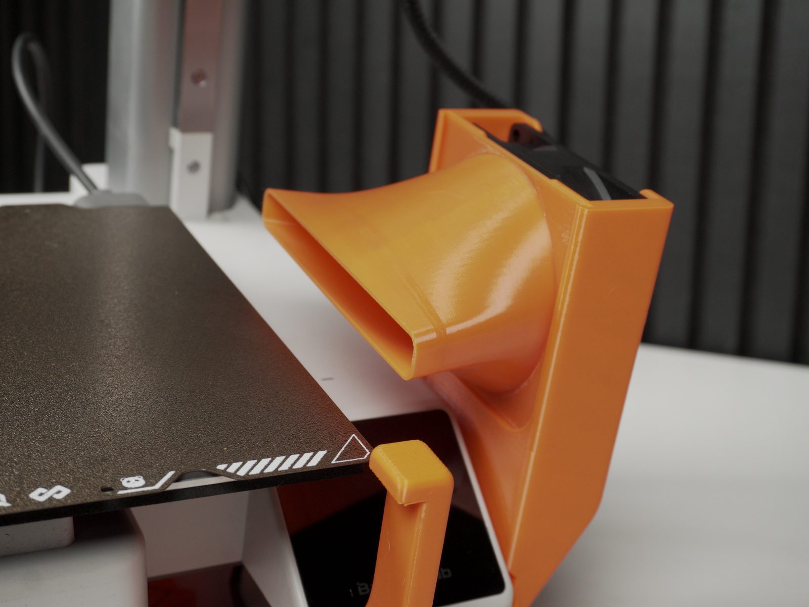 Fan duct sliding into slits from above