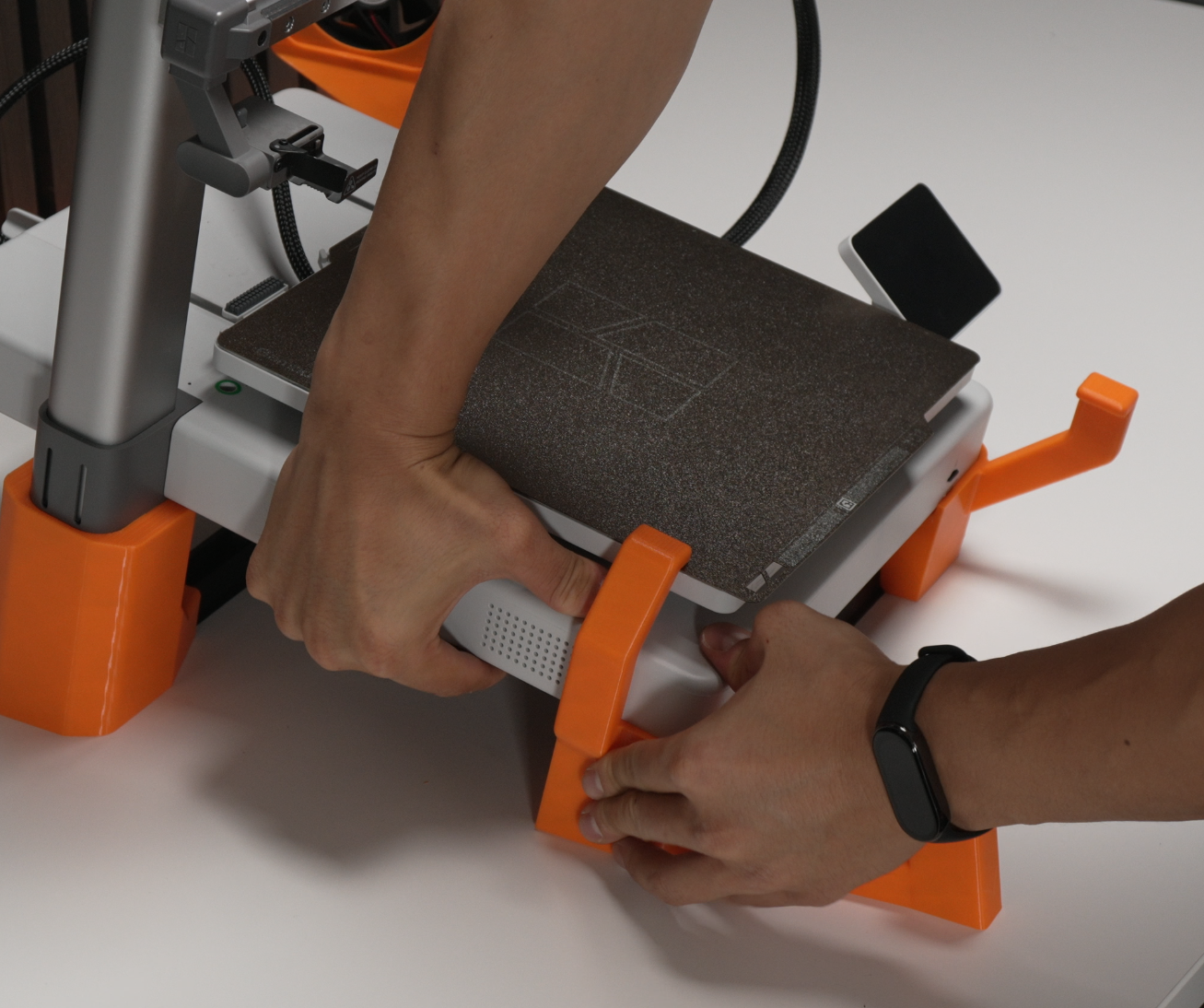 Printer seated on tilted base