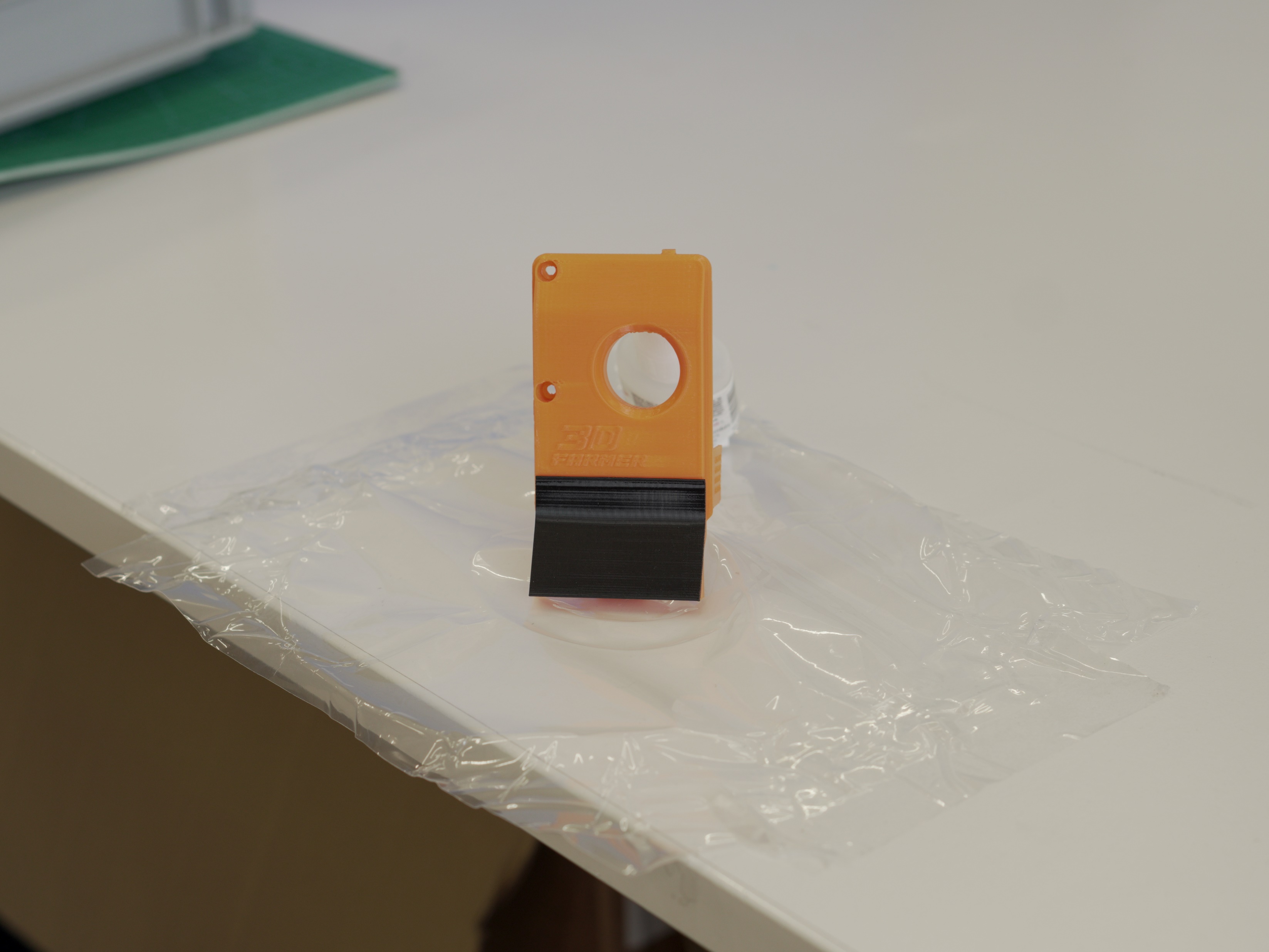 Parts pressed together on a non-stick surface