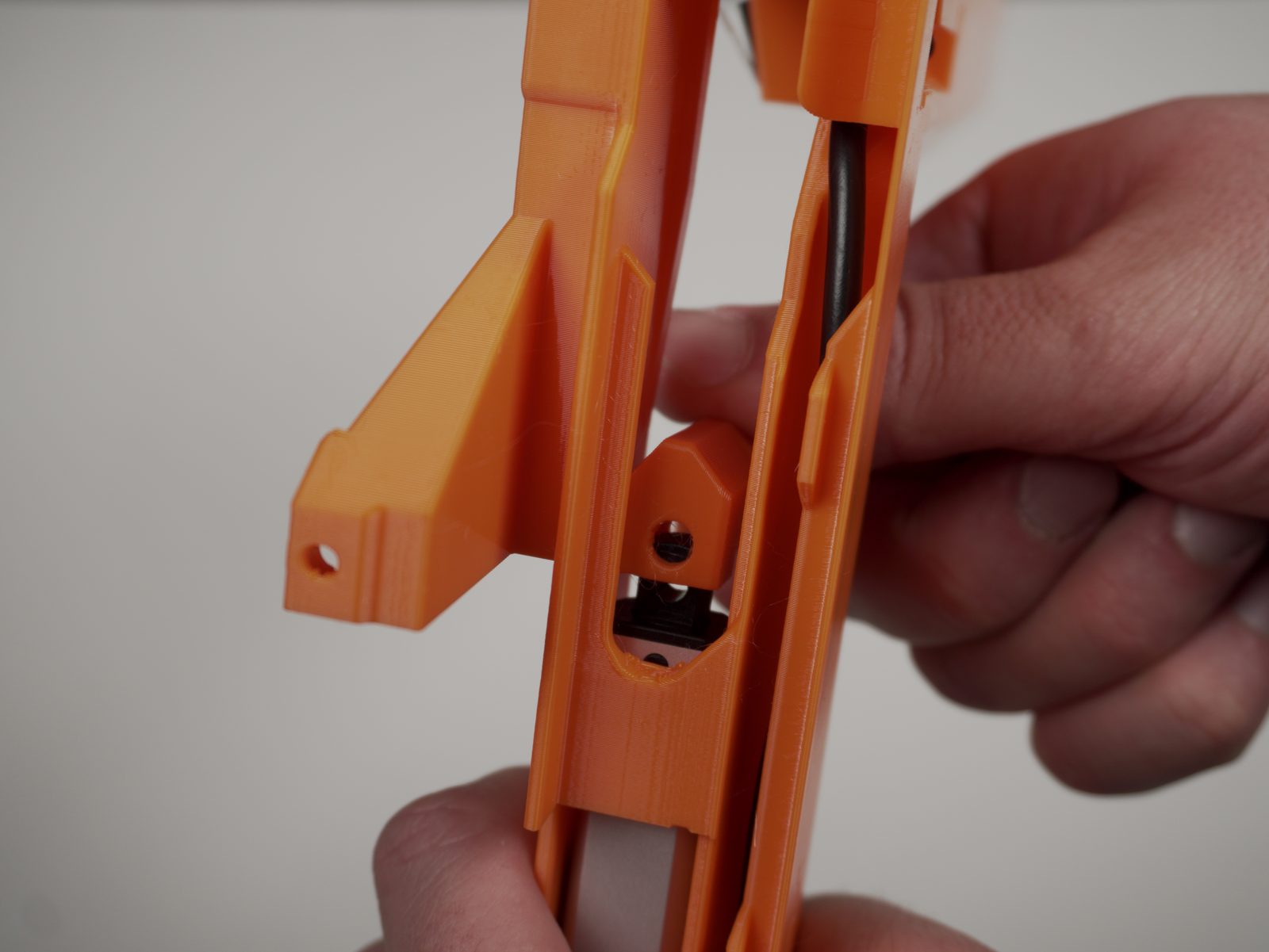 Lifter hook screw hole positioned at the top of the bender rail
