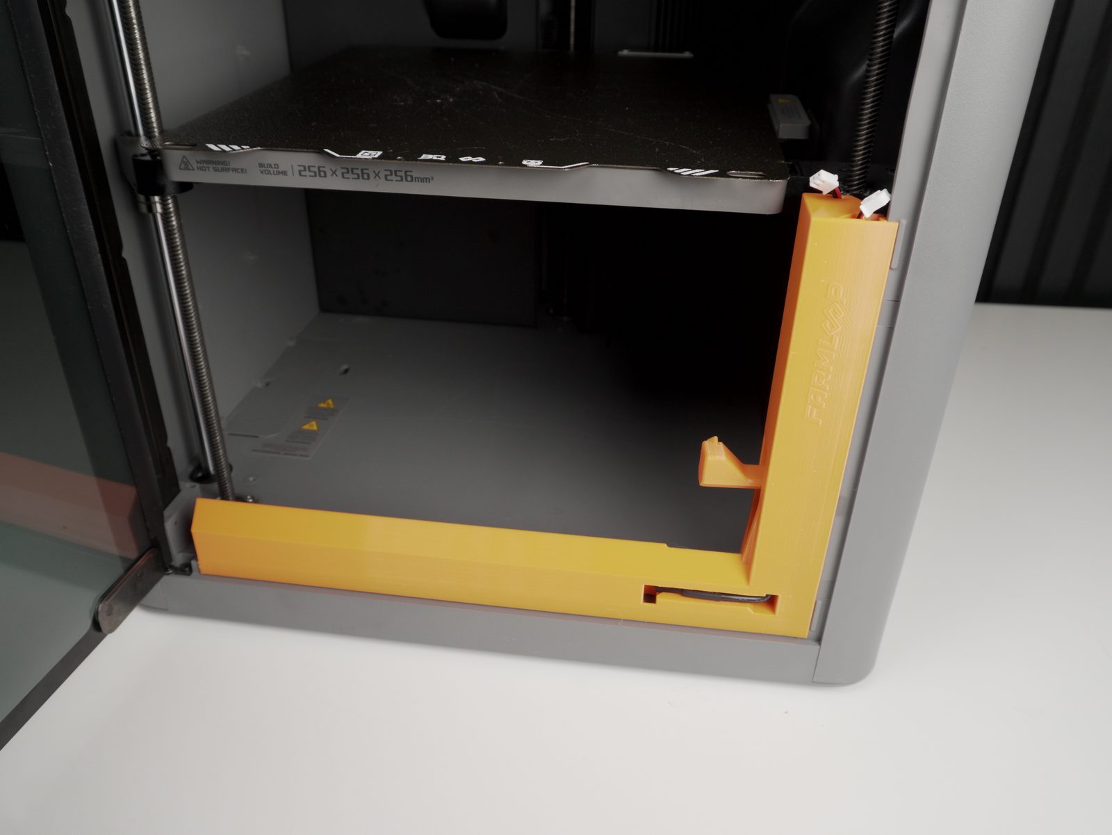 Bender module inserted at the printer corner, cables connected
