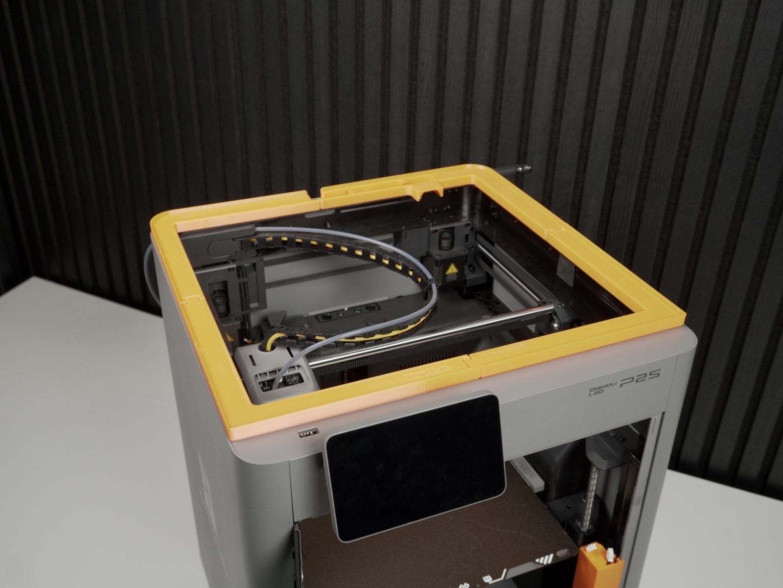 Frame assembled and laid on top of the printer, cables routed through the drag chain