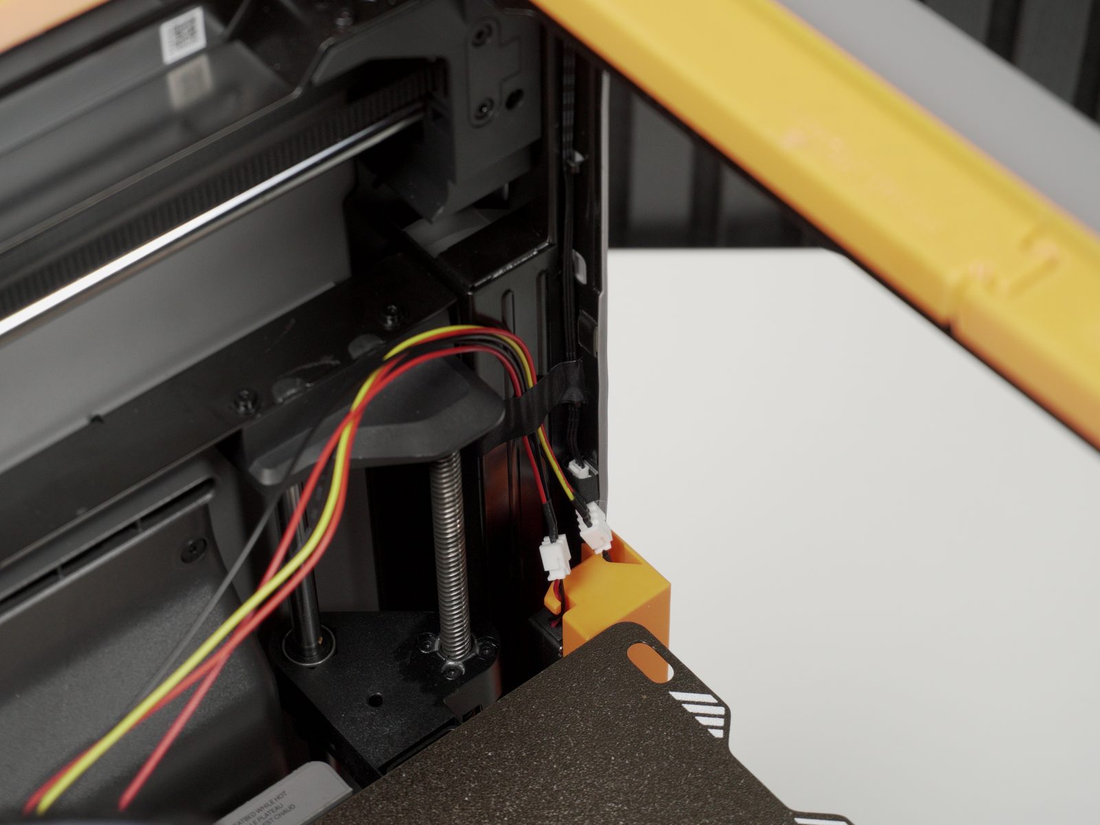 Cable routing through the top frame