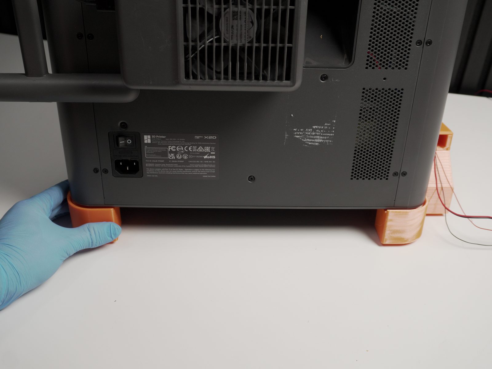 Feet installed on the X2D printer in the same position as the original feet