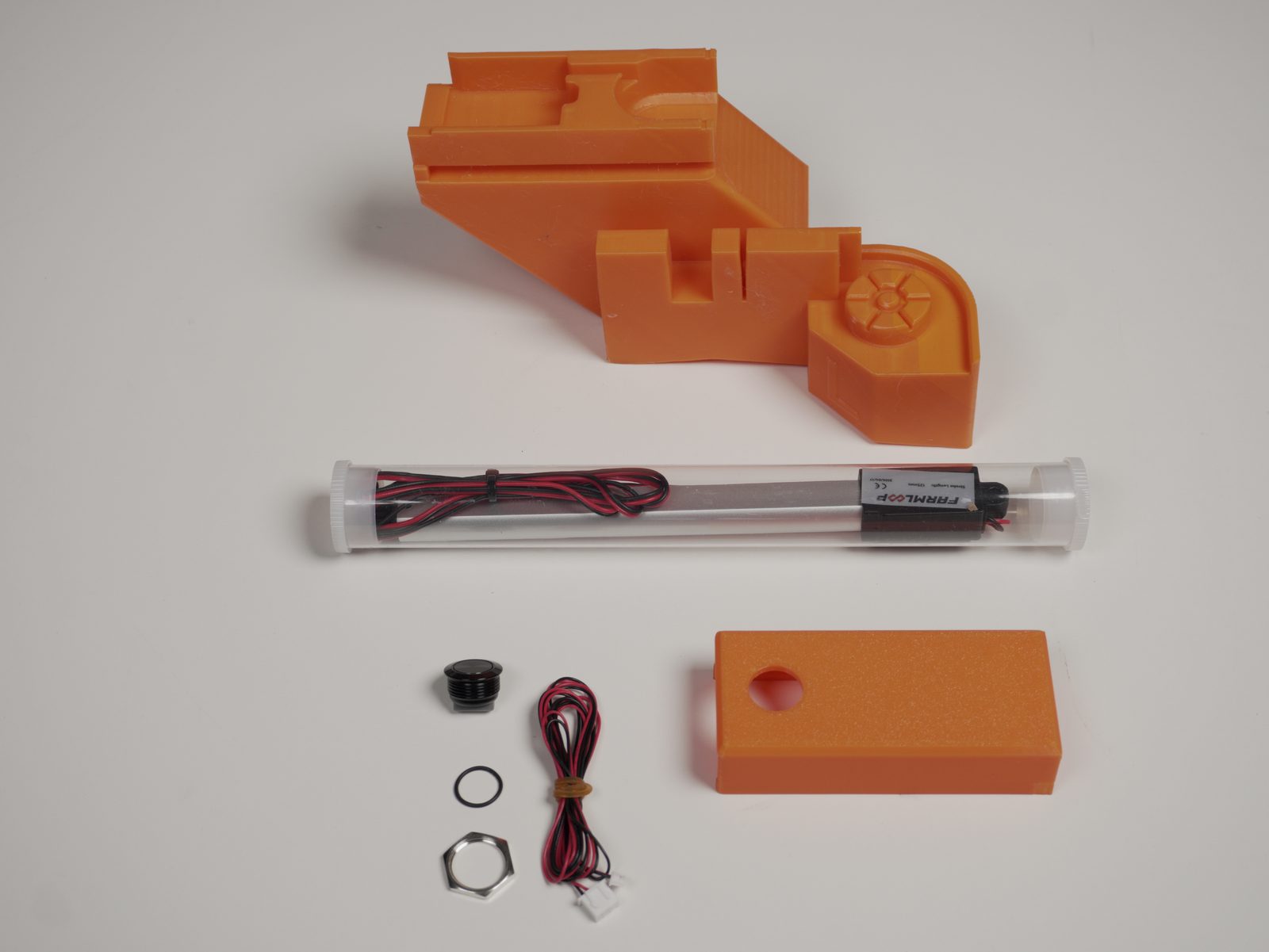 Door-opener parts laid out: printed housing, linear actuator, button, O-ring, hex nut, and feet-replacement cover