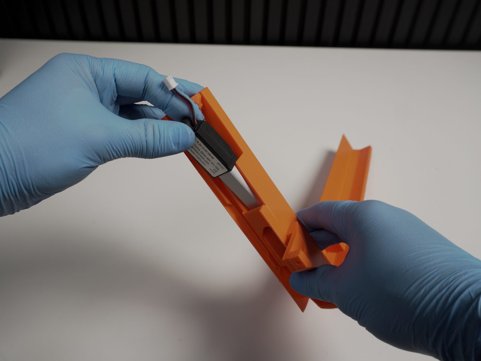 Sliding the bender actuator into the rail