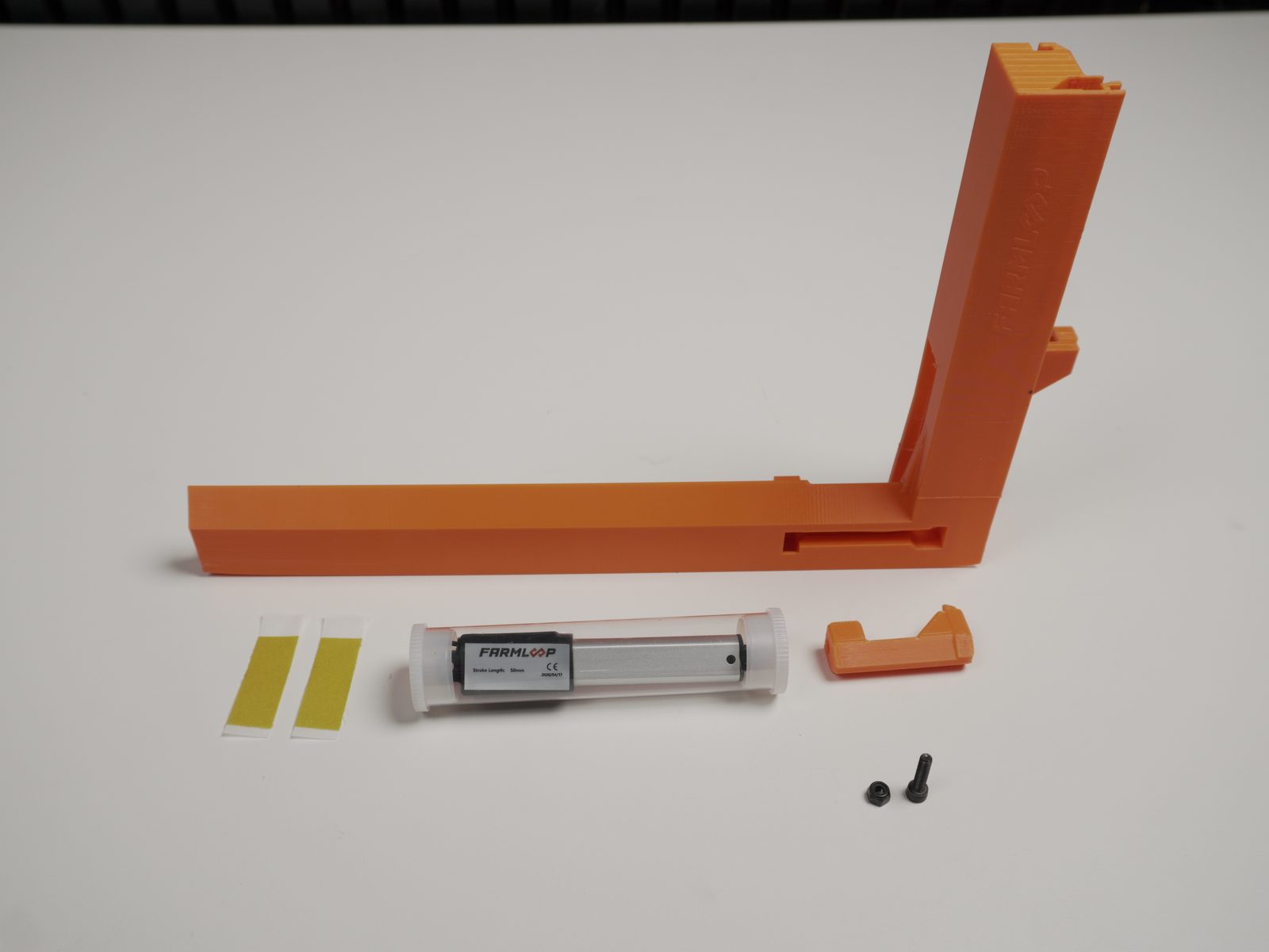 Bender parts laid out: rail, linear actuator, lifter hook, screws, and limit-switch cable