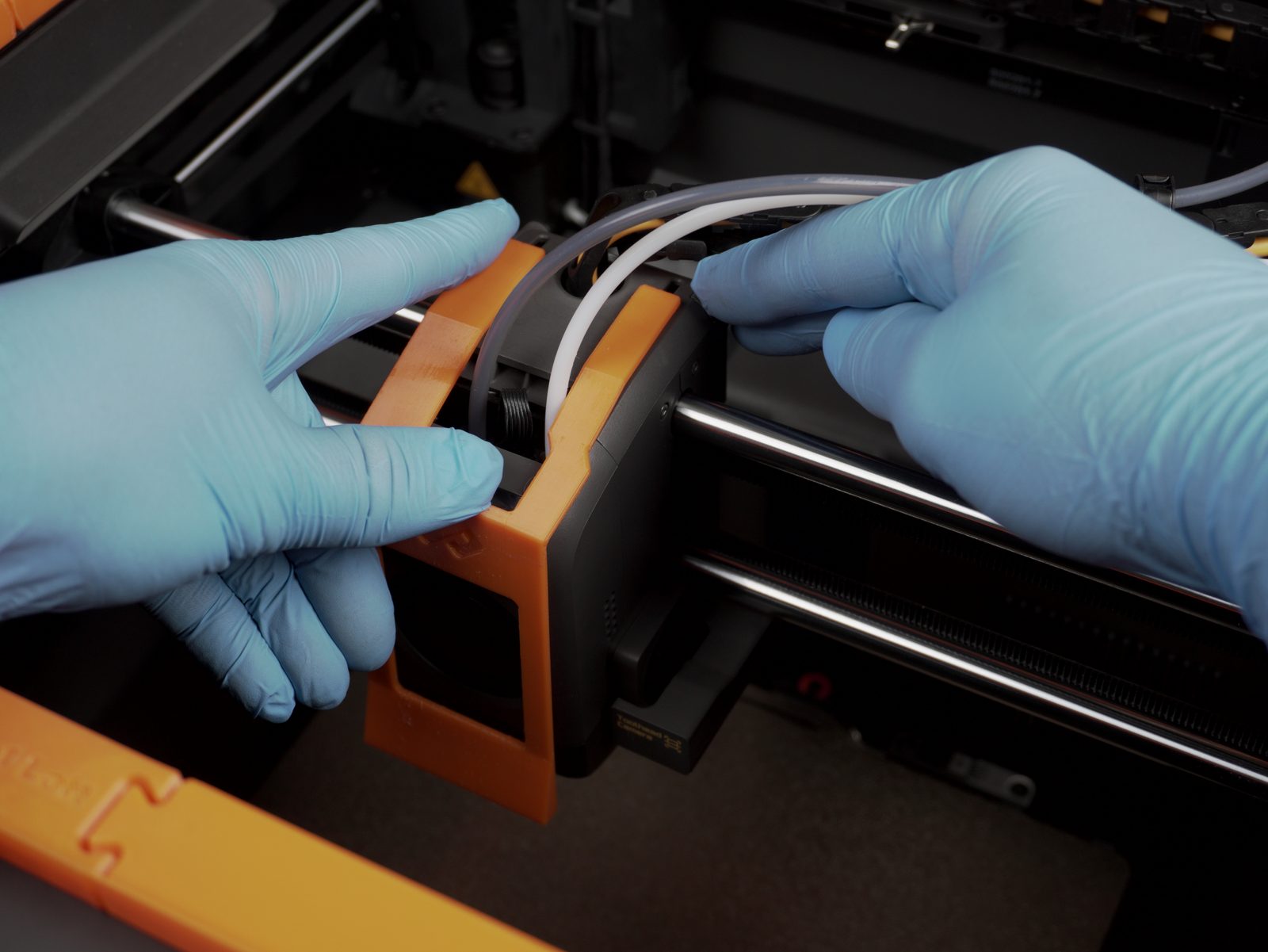Pulling the scraper cover over the print head