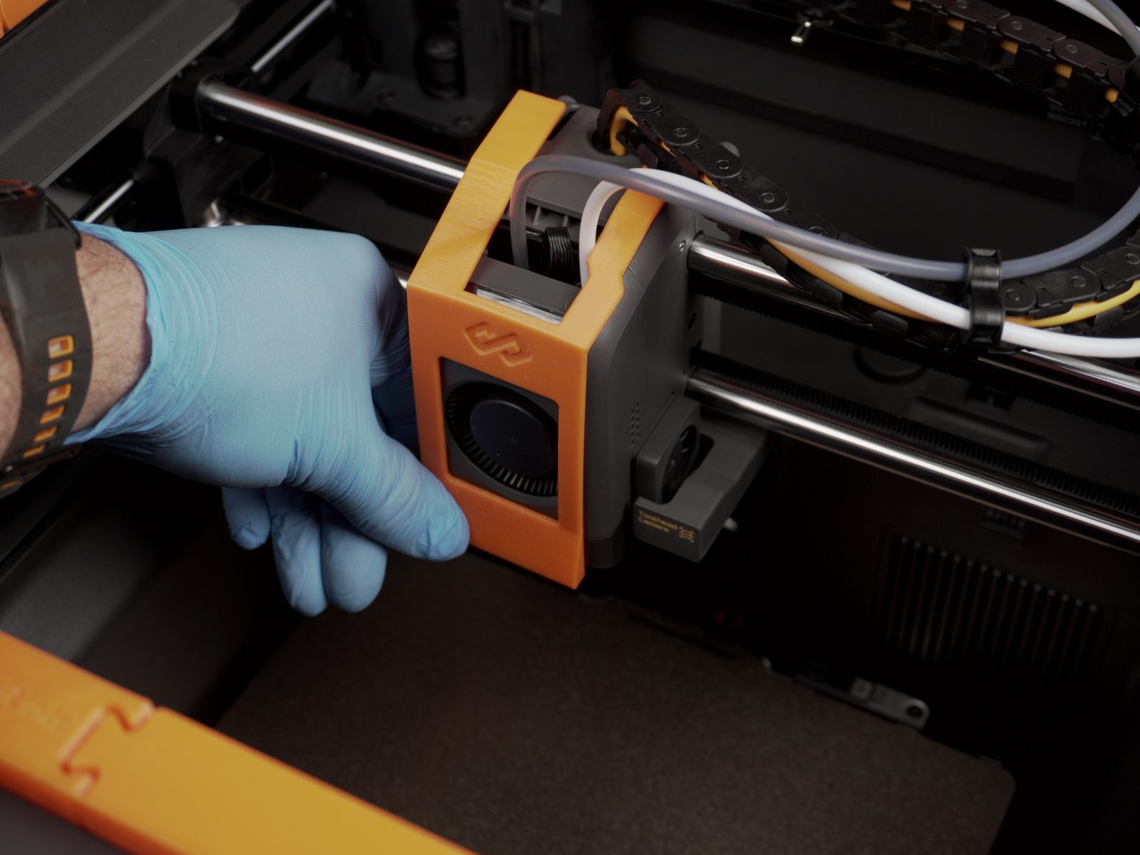 Scraper cover pulled down over the front of the print head
