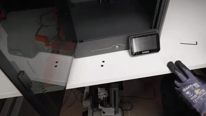 Removing the 4 bolts at the front panel