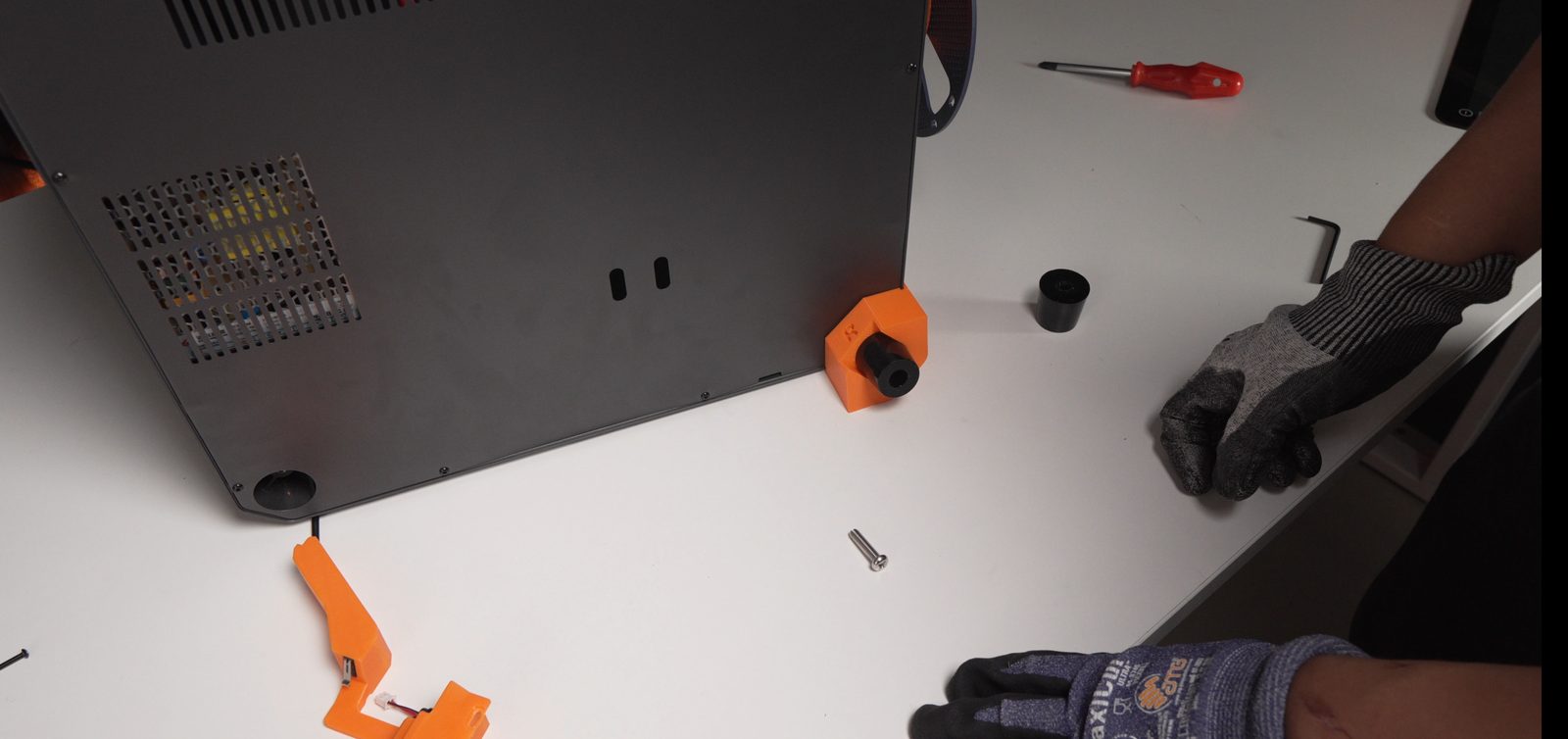 Right rubber foot removed