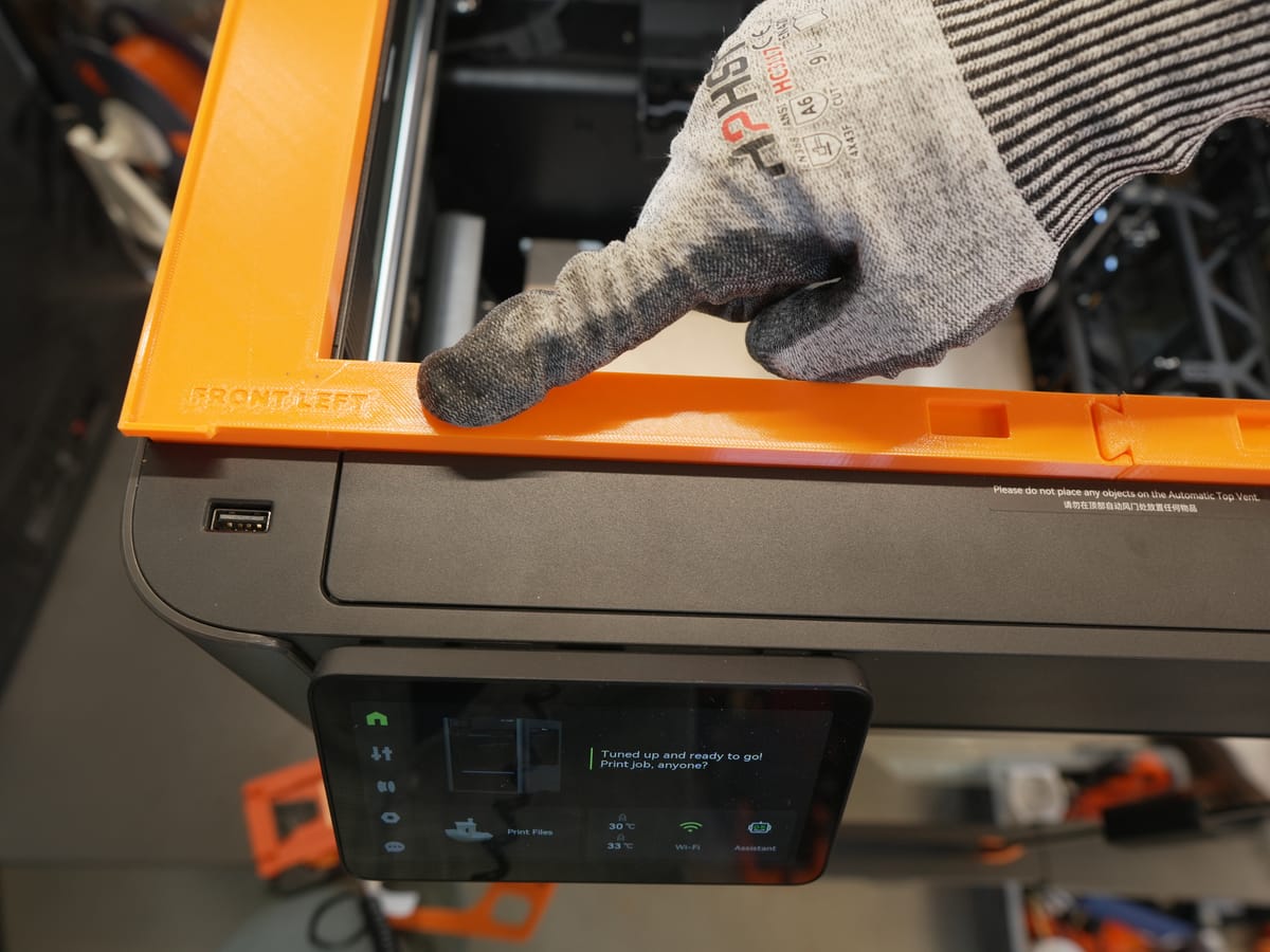 Lid lifter seated in its designated slot on the H2C