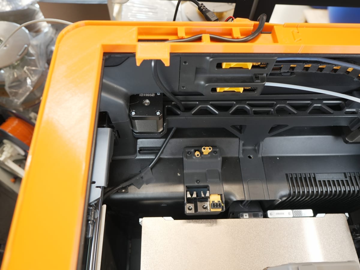 Wire harness threaded through the designated opening on the H2C