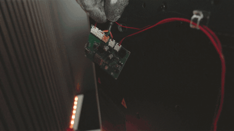 PCB holder secured to the back panel with the top screw, H2D