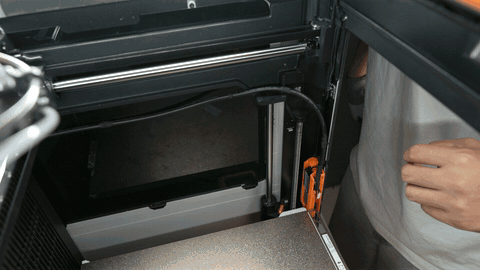 Wire harness guide slid into the chassis gap, harness routed through the guide on the H2D