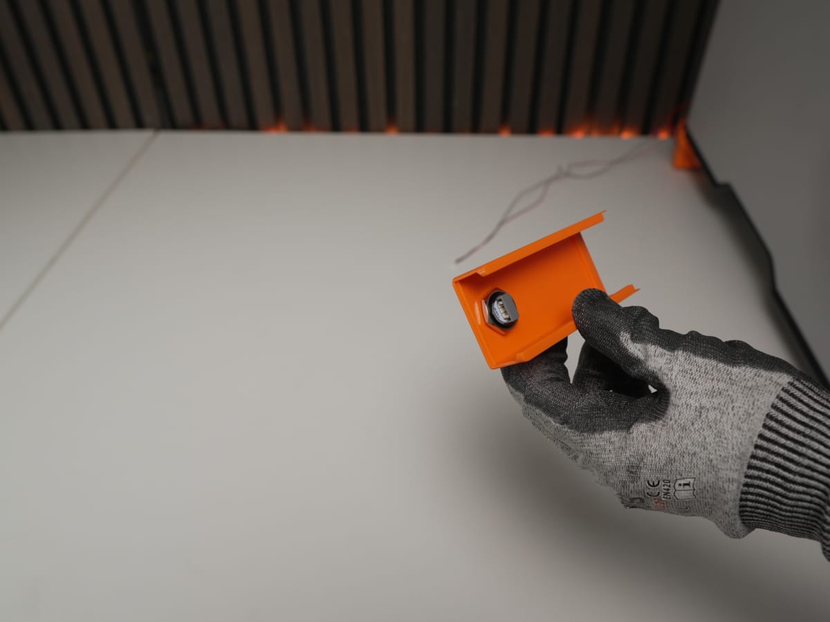 Button secured with the rubber ring and metal ring