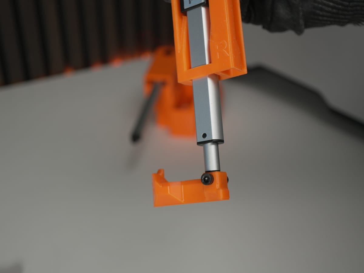 Hook attached to the actuator with screws tightened