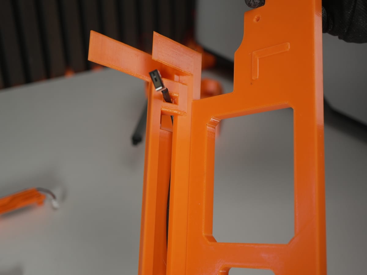 Endstop switch pressed into the slot in the left floor part