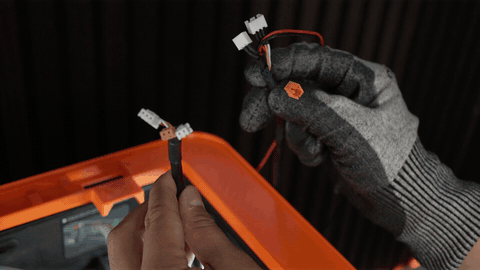 Wire harness threaded through the designated opening into the print room