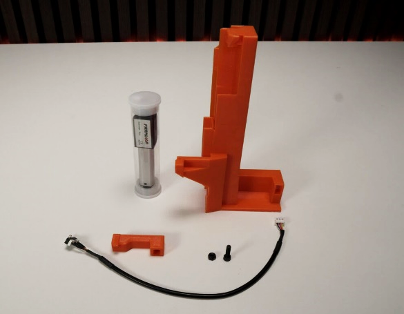 Bender parts laid out: holder, actuator, lifter, cable