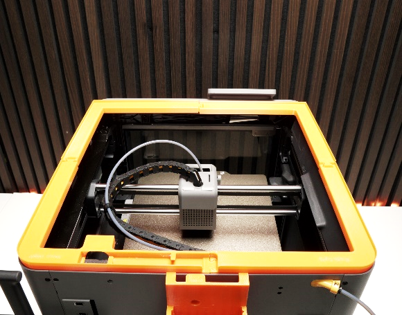 Cable routing through the top frame