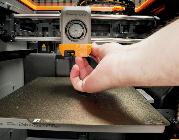 Scraper placed on the printer head