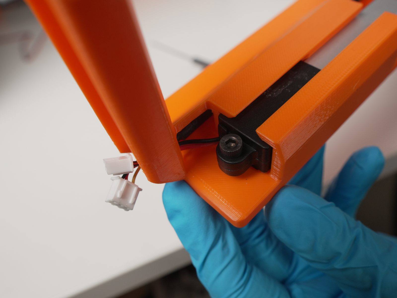 Limit-switch cable seated in the channel