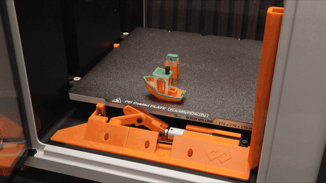 FarmLoop Stage 2 bending the build plate and pushing a finished print off the Snapmaker U1